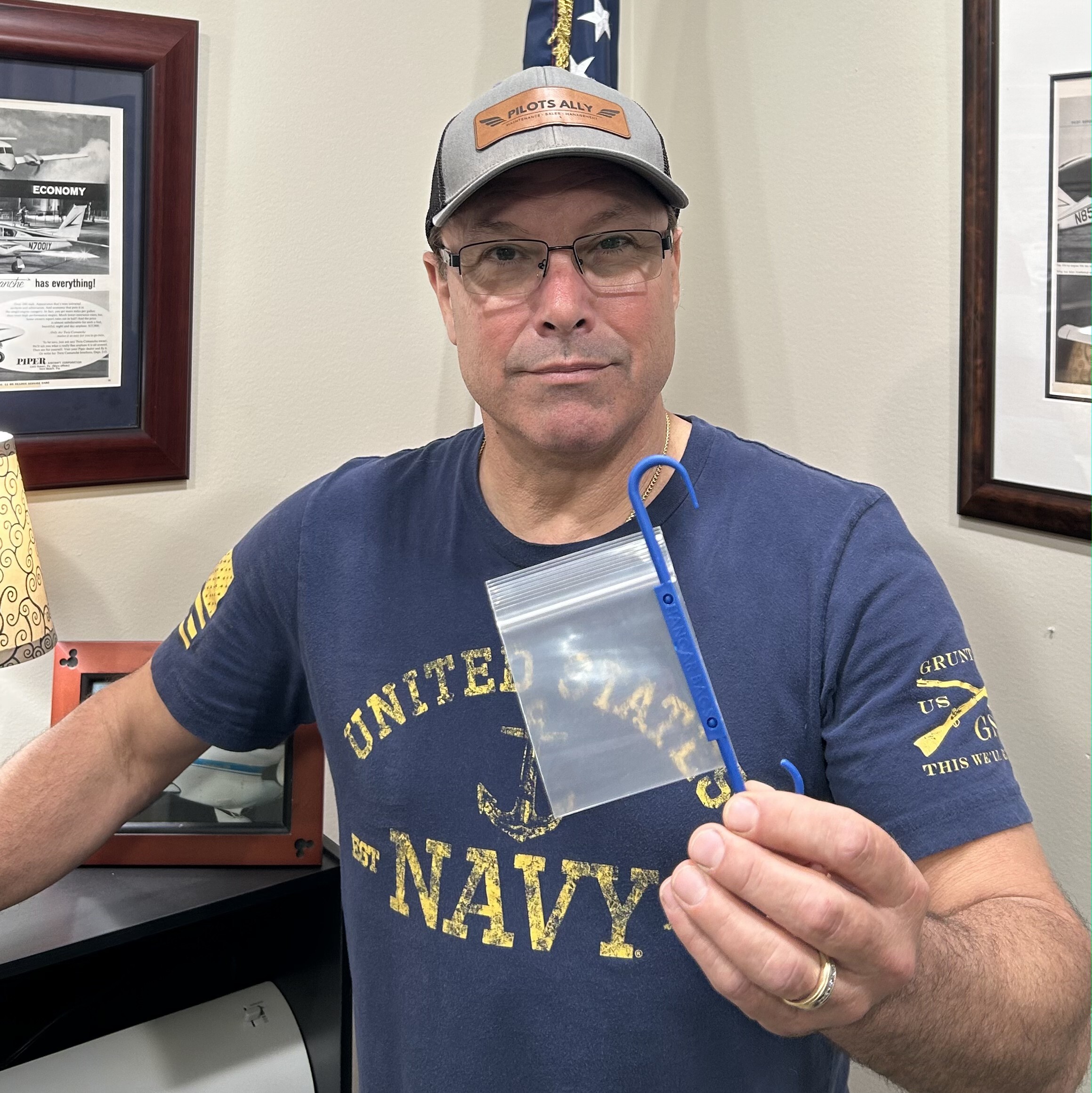 Hangar Bags founder holding the product